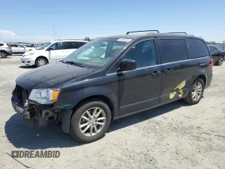 2018 Dodge Grand Caravan SXT z VIN 2C4RDGCG6JR264490, wystawiony jako Copart lot #63062865 z przebiegiem 111 984 mil mil oraz Szkoda całkowita • Salvage title. Historia ofert i sprzedaży dostępna na DreamBid. Obrazek 1.