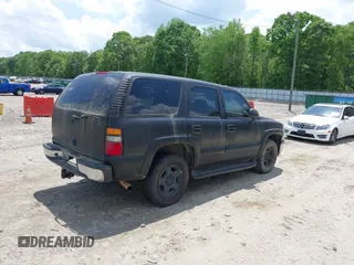 2004 Chevrolet Tahoe LT with VIN 1GNEC13Z64J301294, listed as a IAAI auction lot 42097936 with Not provided miles and . Bid and sale history available at DreamBid. Image 4.