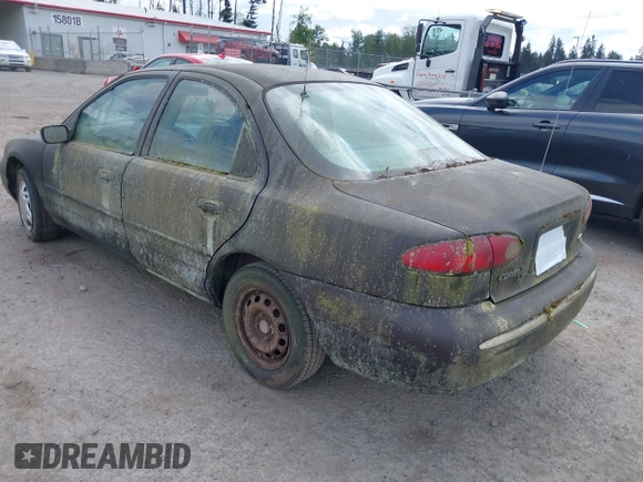 1995 Ford Contour z VIN 3FALP6633SM116313, wystawiony jako IAAI lot #42058920 z przebiegiem 192 905 mil mil oraz . Historia ofert i sprzedaży dostępna na DreamBid. Obrazek 3.