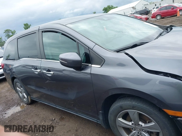 2018 Honda Odyssey EX-L z VIN 5FNRL6H74JB043276, wystawiony jako IAAI lot #42326742 z przebiegiem 126 025 mil mil oraz . Historia ofert i sprzedaży dostępna na DreamBid. Obrazek 13.