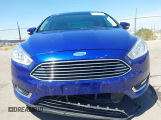 2015 Ford Focus Titanium with VIN 1FADP3J25FL314903, listed as a IAAI auction lot 42053132 with 125,418 mi miles and . Bid and sale history available at carsss.com. Image 13.