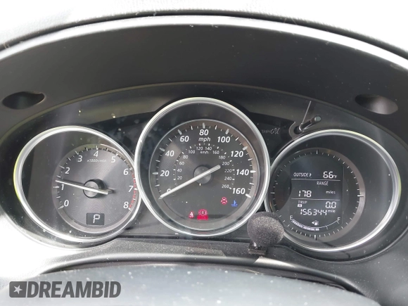 2015 Mazda CX-5 Touring with VIN JM3KE4CY4F0488484, listed as a IAAI auction lot 42115093 with 156,344 mi miles. Bid and sale history available at carsss.com. Image 7.