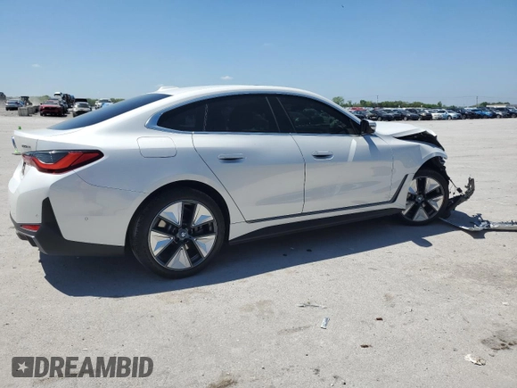 2023 BMW i4 eDrive35 with VIN WBY43AW02PFP53587, listed as a Copart auction lot 51493324 with 15,595 mi miles. Bid and sale history available at carsss.com. Image 3.