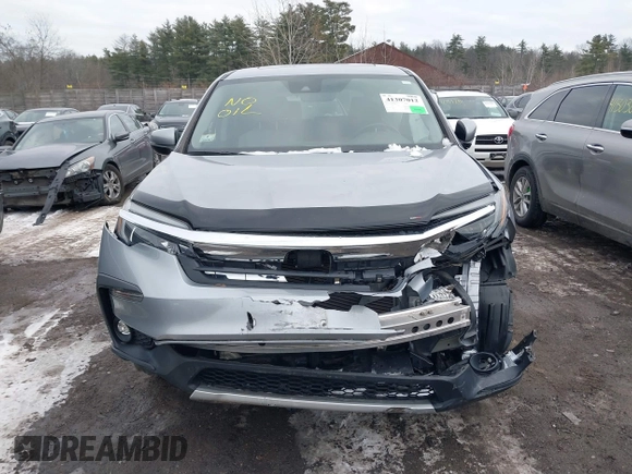 2021 Honda Pilot EX-L with VIN 5FNYF6H57MB010259, listed as a IAAI auction lot 41307012 with 57,849 mi miles. Bid and sale history available at carsss.com. Image 12.
