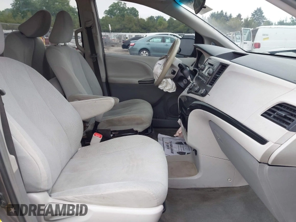 2014 Toyota Sienna L with VIN 5TDZK3DC5ES439593, listed as a IAAI auction lot 42420219 with 136,544 mi miles and . Bid and sale history available at DreamBid. Image 5.