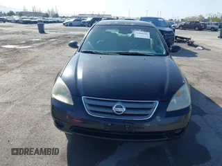 2003 Nissan Altima S with VIN 1N4AL11D93C268136, listed as a IAAI auction lot 41960386 with 181,444 mi miles. Bid and sale history available at carsss.com. Image 12.