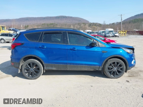 2019 Ford Escape SE with VIN 1FMCU9GD7KUB44070, listed as a IAAI auction lot 41801706 with 77,612 mi miles. Bid and sale history available at carsss.com. Image 13.