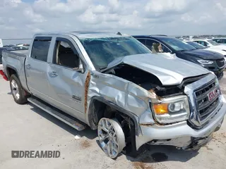 2014 GMC Sierra 1500 SLT with VIN 3GTU2VEC5EG205439, listed as a IAAI auction lot 42415463 with 143,214 mi miles and . Bid and sale history available at DreamBid. Image 1.