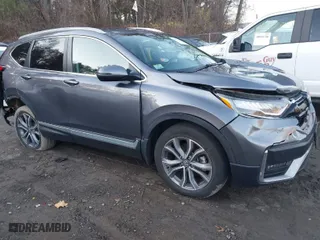 2022 Honda CR-V Hybrid Touring with VIN 5J6RT6H9XNL038288, listed as a IAAI auction lot 40955705 with 61,153 mi miles. Bid and sale history available at carsss.com. Image 1.