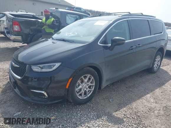 2022 Chrysler Pacifica Touring L with VIN 2C4RC1BG3NR181915, listed as a IAAI auction lot 41946833 with 69,590 mi miles and . Bid and sale history available at DreamBid. Image 18.