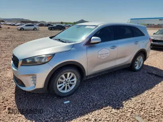 2019 Kia Sorento LX z VIN 5XYPG4A30KG595861, wystawiony jako Copart lot #60448415 z przebiegiem 126 967 mil mil oraz Czysty tytuł • Clean title. Historia ofert i sprzedaży dostępna na DreamBid. Obrazek 1.