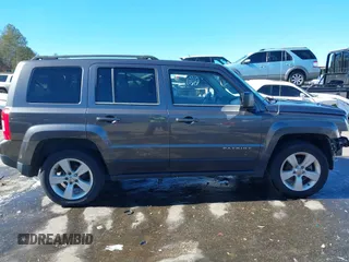 2014 Jeep Patriot Latitude with VIN 1C4NJRFB3ED886007, listed as a IAAI auction lot 41285963 with 127,007 mi miles and . Bid and sale history available at DreamBid. Image 14.