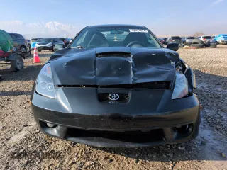 2002 Toyota Celica GT with VIN JTDDR32T620116886, listed as a Copart auction lot 82425874 with 203,196 mi miles and Salvage Title. Bid and sale history available at carsss.com. Image 5.