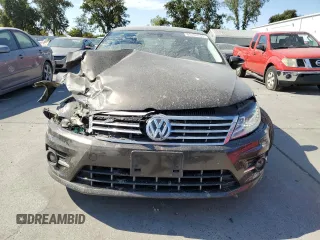 2014 Volkswagen CC R-Line with VIN WVWBP7AN7EE537157, listed as a Copart auction lot 65404654 with 153,336 mi miles and Salvage Title. Bid and sale history available at DreamBid. Image 5.