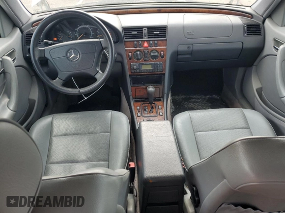 2000 Mercedes-Benz C 230 Kompressor with VIN WDBHA24G1YA820238, listed as a Copart auction lot 55563994 with 264,556 mi miles and Salvage Title. Bid and sale history available at carsss.com. Image 8.