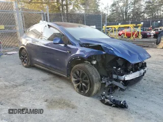 2022 Tesla Model X with VIN 7SAXCDE59NF358968, listed as a Copart auction lot 45954875 with Not Provided miles and Salvage Title. Bid and sale history available at DreamBid. Image 4.