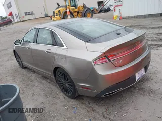 2018 Lincoln MKZ Hybrid Reserve z VIN 3LN6L5MU2JR602228, wystawiony jako IAAI lot #41441004 z przebiegiem 71 047 mil mil oraz . Historia ofert i sprzedaży dostępna na DreamBid. Obrazek 3.