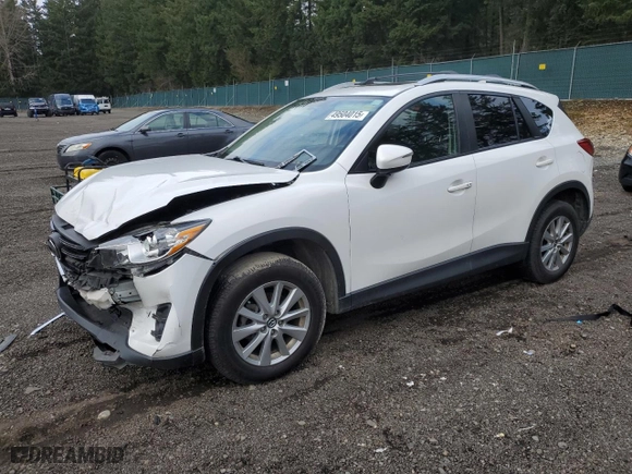 2016 Mazda CX-5 Touring with VIN JM3KE4CY5G0908092, listed as a Copart auction lot 49504015 with 126,825 mi miles and Salvage Title. Bid and sale history available at carsss.com. Image 1.