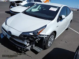2021 Toyota Prius L Eco with VIN JTDKAMFU9M3133528, listed as a IAAI auction lot 41950856 with 138,787 mi miles. Bid and sale history available at carsss.com. Image 17.