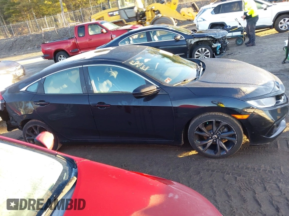 2019 Honda Civic Sport with VIN 2HGFC2F84KH514704, listed as a IAAI auction lot 41225362 with 43,111 mi miles and . Bid and sale history available at DreamBid. Image 13.