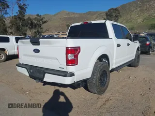 2020 Ford F-150 XL with VIN 1FTEW1CP7LKD24719, listed as a IAAI auction lot 41670273 with 57,188 mi miles. Bid and sale history available at carsss.com. Image 4.
