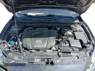 2015 Mazda 3 S Grand Touring with VIN JM1BM1M34F1258936, listed as a IAAI auction lot 42071464 with 100,933 mi miles and . Bid and sale history available at DreamBid. Image 10.