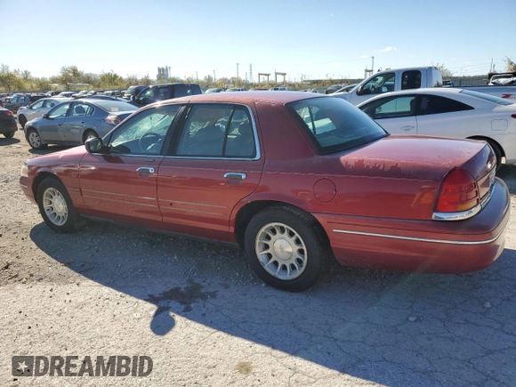 1998 Ford Crown Victoria LX с VIN 2FAFP74W4WX118422, выставлен на аукционе Copart как лот 78716184 с пробегом 70 214 миль миль и Списание • Salvage title. История ставок и продаж доступна на DreamBid. Изображение 2.
