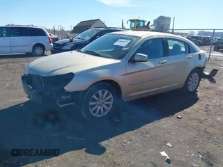 2010 Chrysler Sebring Limited with VIN 1C3CC5FD8AN194636, listed as a IAAI auction lot 41664232 with 139,264 mi miles and . Bid and sale history available at DreamBid. Image 2.