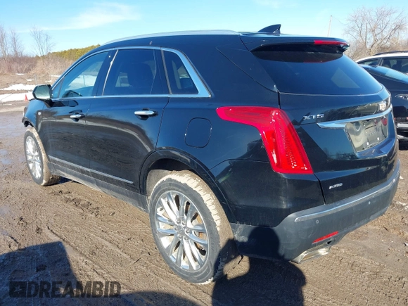 2019 Cadillac XT5 Premium Luxury AWD z VIN 1GYKNFRS1KZ250468, wystawiony jako IAAI lot #41764152 z przebiegiem 107 918 mil mil oraz . Historia ofert i sprzedaży dostępna na DreamBid. Obrazek 3.