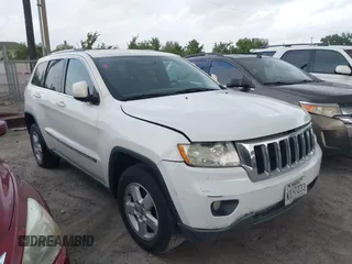 2011 Jeep Grand Cherokee 70th Anniversary with VIN 1J4RR4GG4BC562003, listed as a IAAI auction lot 42022419 with 231,786 mi miles. Bid and sale history available at carsss.com. Image 1.