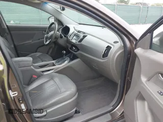 2011 Kia Sportage EX with VIN KNDPC3A23B7029574, listed as a IAAI auction lot 42168504 with 208,407 mi miles. Bid and sale history available at carsss.com. Image 5.