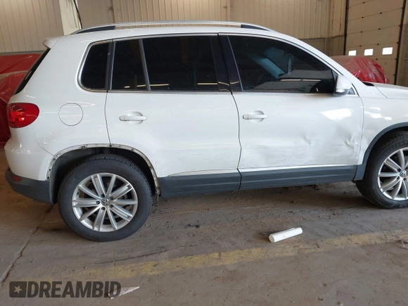 2012 Volkswagen Tiguan S z VIN WVGBV7AXXCW572690, wystawiony jako IAAI lot #42074464 z przebiegiem 133 049 mil mil oraz . Historia ofert i sprzedaży dostępna na DreamBid. Obrazek 12.