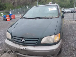 2001 Toyota Sienna LE with VIN 4T3ZF13C71U351289, listed as a IAAI auction lot 41966579 with 254,740 mi miles. Bid and sale history available at carsss.com. Image 6.