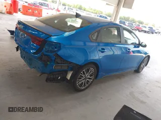 2023 Kia Forte GT-Line z VIN 3KPF54AD9PE621839, wystawiony jako IAAI lot #42219283 z przebiegiem 28 639 mil mil oraz . Historia ofert i sprzedaży dostępna na DreamBid. Obrazek 4.