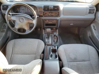 1998 Honda Passport LX with VIN 4S6CM58W7W4419247, listed as a Copart auction lot 88231175 with 194,105 mi miles and Salvage Title. Bid and sale history available at carsss.com. Image 8.