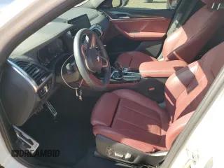 2021 BMW X4 xDrive30i with VIN 5UX2V1C0XM9E11002, listed as a Copart auction lot 67348653 with 27,805 mi miles. Bid and sale history available at carsss.com. Image 7.