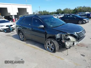 2007 Lexus RX 400h with VIN JTJGW31U272004272, listed as a IAAI auction lot 41286908 with 145,539 mi miles and . Bid and sale history available at DreamBid. Image 1.