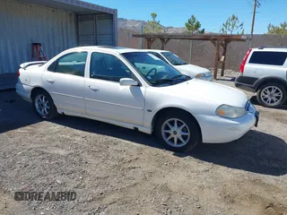 1999 Ford Contour SE Fleet with VIN 1FAFP66LXXK126297, listed as a IAAI auction lot 41861999 with 80,318 mi miles. Bid and sale history available at carsss.com. Image 1.