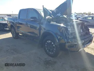 2024 Nissan Titan Pro-4X with VIN 1N6AA1ED9RN113154, listed as a IAAI auction lot 41352672 with 11,753 mi miles and . Bid and sale history available at DreamBid. Image 1.