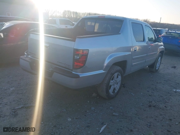 2014 Honda Ridgeline RTL with VIN 5FPYK1F57EB009199, listed as a IAAI auction lot 41208488 with 100,340 mi miles. Bid and sale history available at carsss.com. Image 4.
