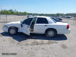 2007 Mercury Grand Marquis LS with VIN 2MEFM75VX7X623356, listed as a IAAI auction lot 41783361 with 157,921 mi miles. Bid and sale history available at carsss.com. Image 15.