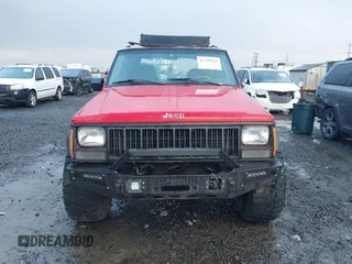 1996 Jeep Cherokee Sport with VIN 1J4FJ68S4TL244893, listed as a IAAI auction lot 41190369 with 192,459 mi miles and . Bid and sale history available at DreamBid. Image 13.