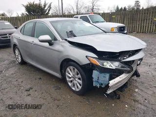 2020 Toyota Camry LE with VIN 4T1C11AK5LU869525, listed as a IAAI auction lot 41693706 with 134,201 mi miles. Bid and sale history available at carsss.com. Image 1.