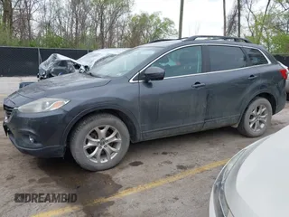 2015 Mazda CX-9 Touring with VIN JM3TB3CA3F0460864, listed as a IAAI auction lot 41944957 with 242,100 mi miles. Bid and sale history available at carsss.com. Image 2.