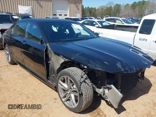 2019 BMW 7 Series 740i xDrive with VIN WBA7E4C57KGV70521, listed as a IAAI auction lot 41881538 with 114,480 mi miles and . Bid and sale history available at DreamBid. Image 1.
