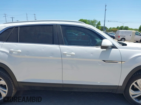 2021 Volkswagen Atlas SEL с VIN 1V2EE2CA8MC202806, выставлен на аукционе IAAI как лот 41984025 с пробегом 126 868 миль миль и . История ставок и продаж доступна на DreamBid. Изображение 13.