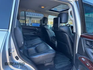 2013 Lexus LX 570 with VIN JTJHY7AXXD4091614, listed as a Copart auction lot 82096184 with 205,635 mi miles and Clean Title. Bid and sale history available at DreamBid. Image 6.