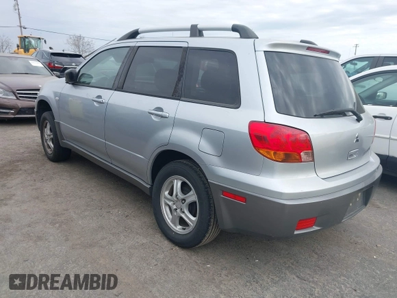 2004 Mitsubishi Outlander LS with VIN JA4LX31F04U038009, listed as a IAAI auction lot 41616254 with 219,527 mi miles. Bid and sale history available at carsss.com. Image 3.