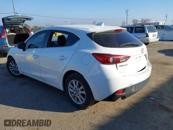 2014 Mazda 3 i Grand Touring with VIN JM1BM1M7XE1102093, listed as a IAAI auction lot 41344433 with 148,395 mi miles and . Bid and sale history available at DreamBid. Image 3.