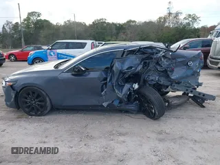 2022 Mazda 3 Carbon Edition z VIN JM1BPACL2N1509492, wystawiony jako IAAI lot #41198183 z przebiegiem Nie podano mil oraz . Historia ofert i sprzedaży dostępna na DreamBid. Obrazek 13.
